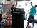 drummer and double-bassist on stage at street festival