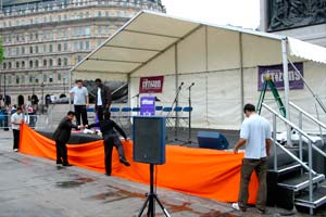 outside stage with microphone and chairs in trafalgar square